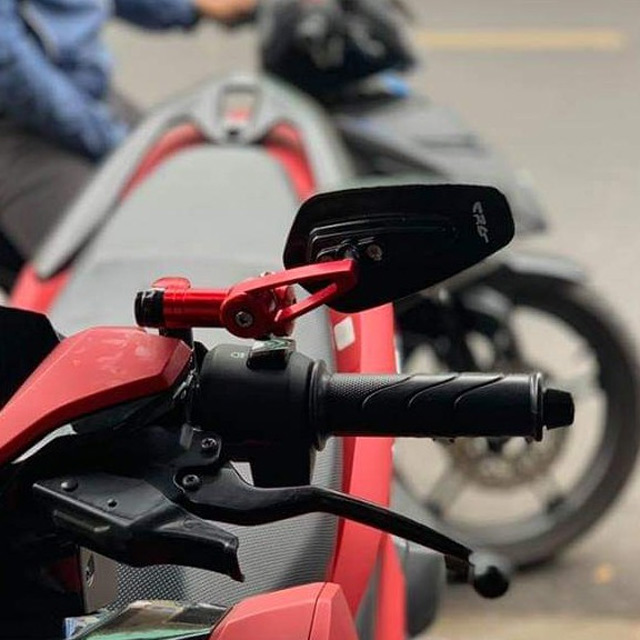 Xe máy lắp gương gù có bị phạt không?